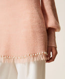 Maglia a lupetto con frange e perle