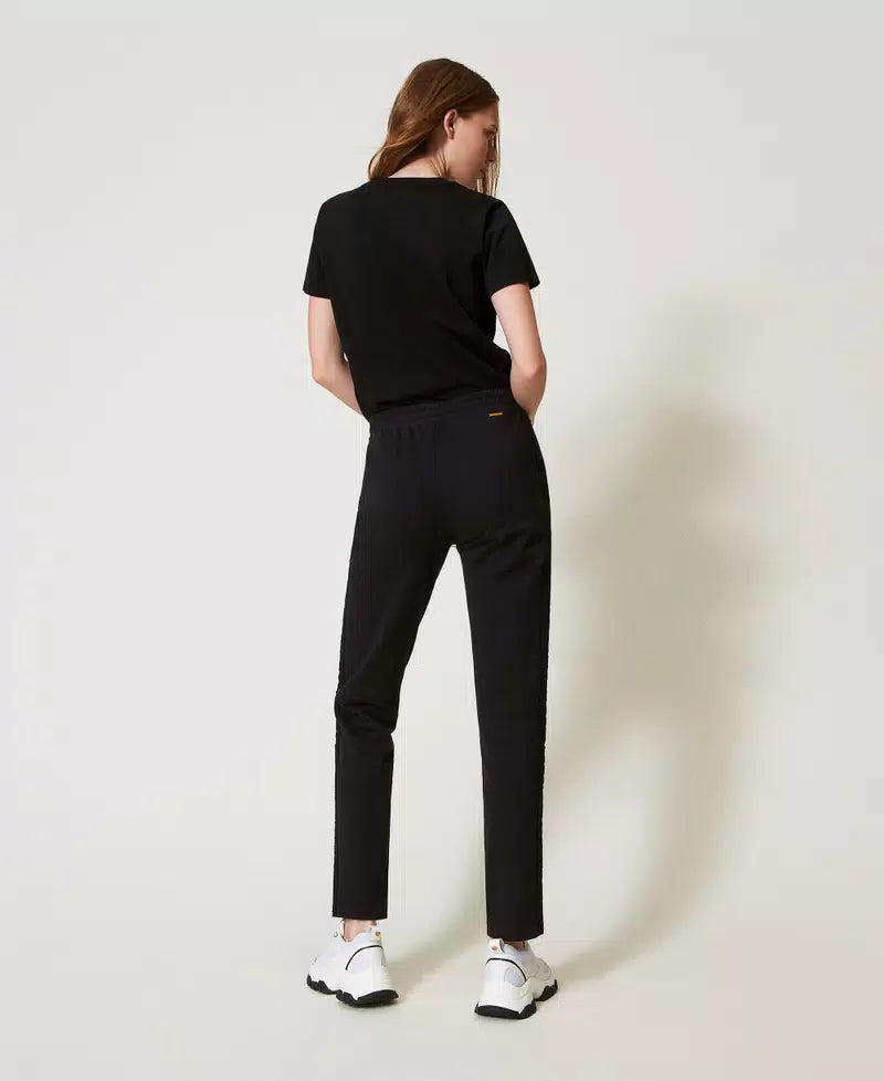 Pantaloni a sigaretta con ricamo