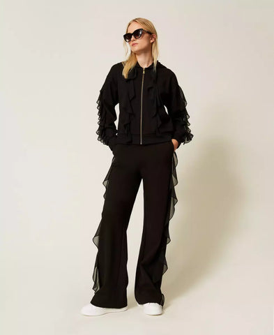 Pantaloni con volant in georgette | TWINSET - PMC Portici

